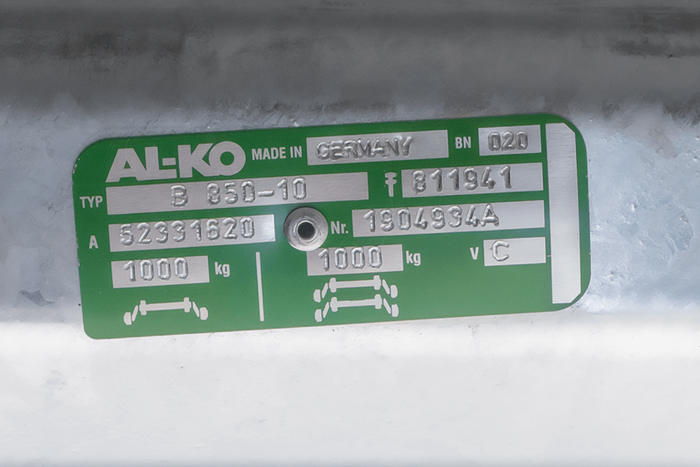 AL-KO COMPACT fékező tengely pótkocsihoz/szállítóhoz 1000kg 1200mm 1570mm 4x100